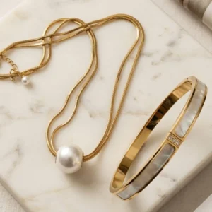 Orbit Pendant & Shell Sol Bracelet